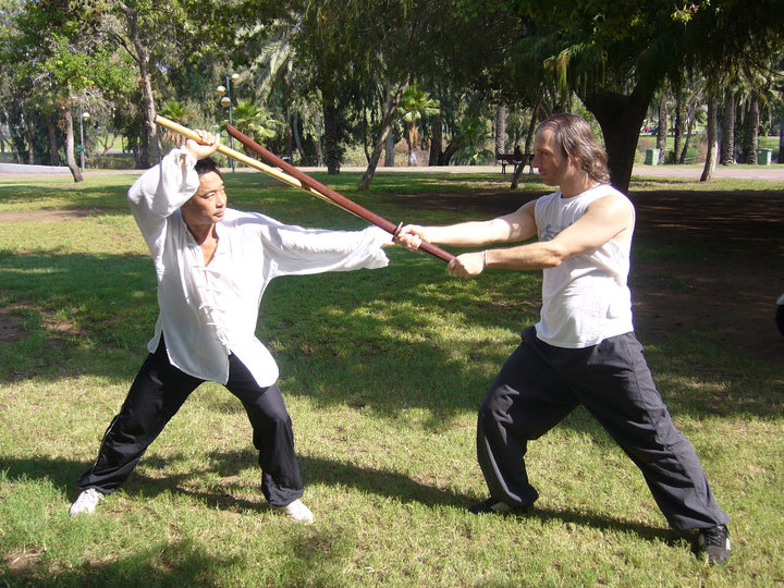 Zhou shifu teaching Ilan – a 3rd Dan Aikidoka from Israel.HaYarkon Park, Tel-Aviv, Israel, August 2010.